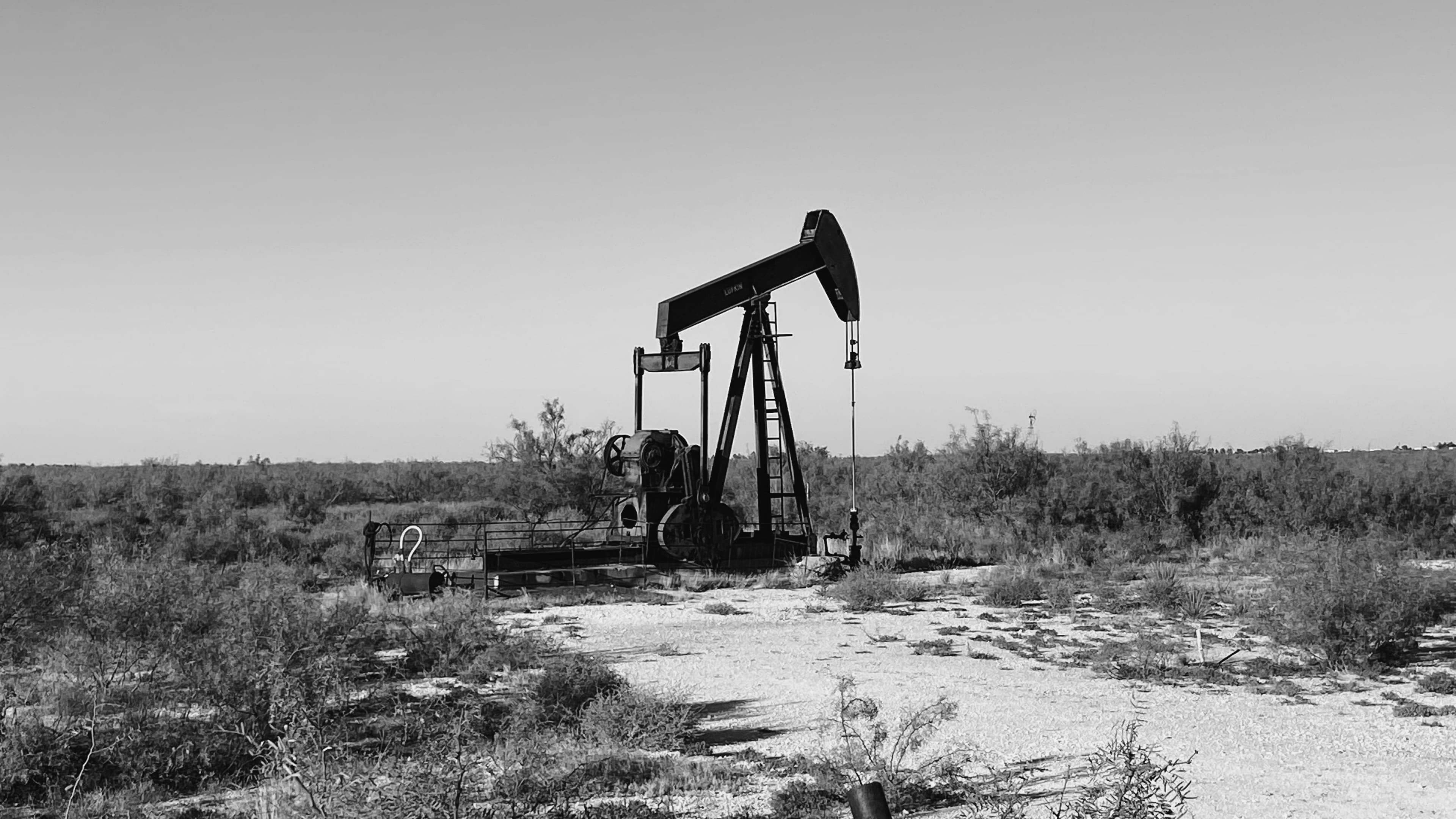A pumpjack producing oil on a well in the Permian Basin of West Texas.